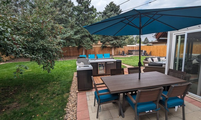 Englewood Apartment | Best Yard in Denver - Hot Tub & Outdoor Kitchen!