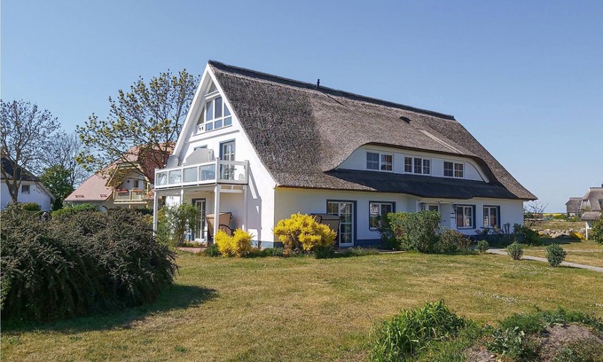 Monchgut-Granitz Apartment | "Between the Baltic Sea beach and the Bodden, the Boddenhus apartment house awaits you with its brig