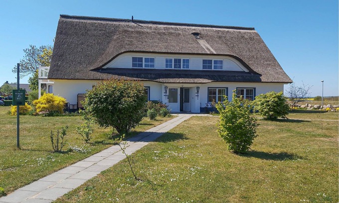 Monchgut-Granitz Apartment | "Between the Baltic Sea beach and the Bodden, the Boddenhus apartment house awaits you with its brig