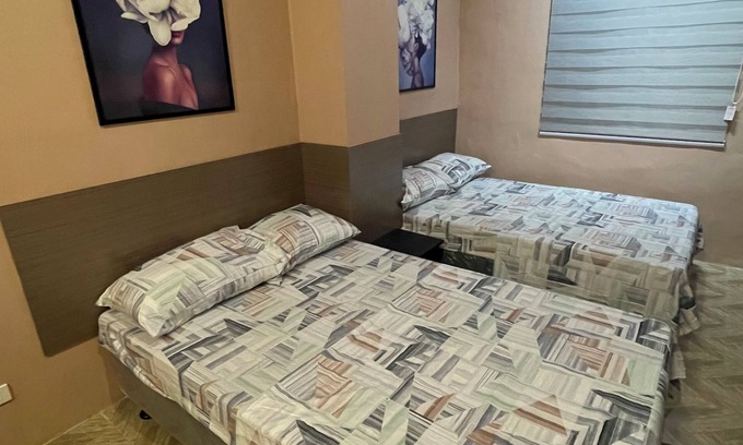 Quezon City Apartment | BIG SIZE ROOM 2 beds MODERN COZY COMFY RELAX STAY FIBER INTERNET NEAR FISHER QC