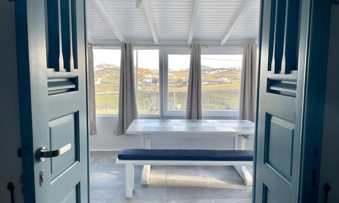Xilokeratidi House | Black Pebble Myconian House