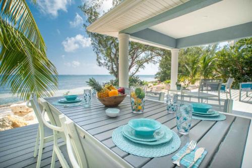 East End House | Blue Moon - A Diver's Paradise in East End Next Door to Ocean Frontiers, Beach Cottage with Upgraded Interiors