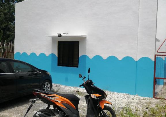 Dauis Apartment | Bluewaves Apartment, scooter, car