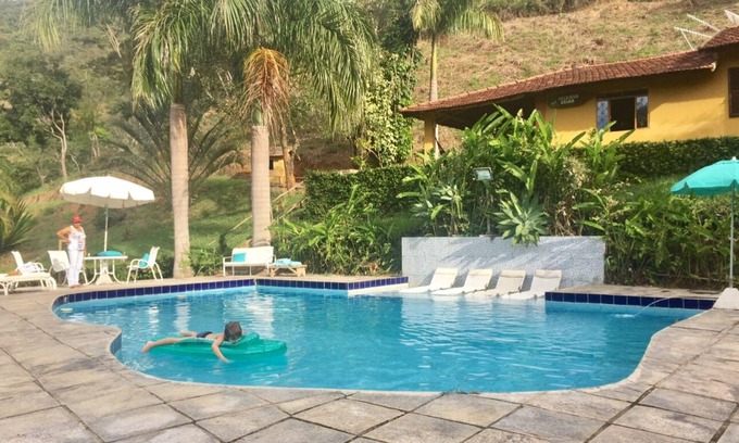 Avelar Cottage | Private waterfall in the garden, swimming pool with small beach and stream with natural pool