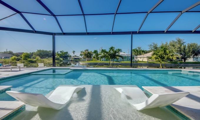 Fort Myers Villa | Brand-new villa for families heated saltwater pool+spa on the canal facing south