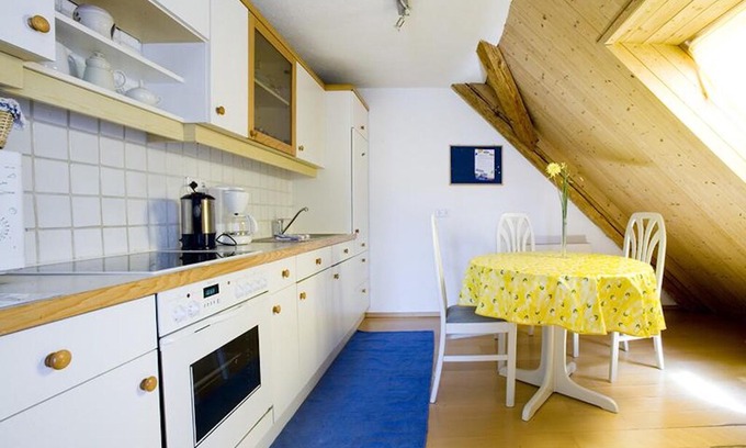 Bregenz Apartment | Bright Holiday Apartment “Ferienwohnung Bregenz 6 Top 4” in Central Location Close to Lake Constance with Wi-Fi, Terrace & Garden