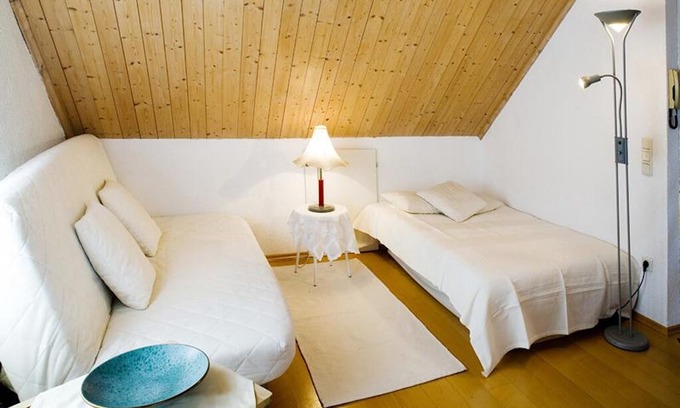 Bregenz Apartment | Bright Holiday Apartment “Ferienwohnung Bregenz 8 Top 4” in Central Location Close to Lake Constance with Wi-Fi, Terrace & Garden