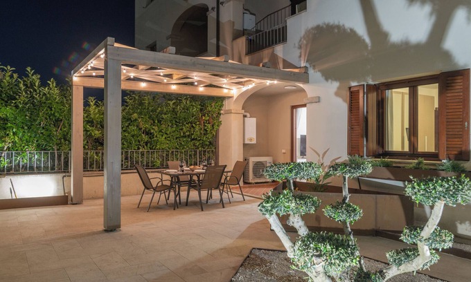 Olbia Apartment | Bright one-bedroom apartment with large garden a few steps from the Olbia waterfront