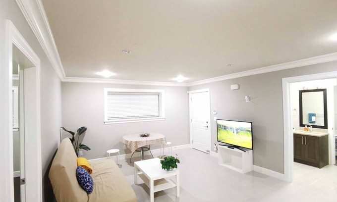 Coquitlam House | Bright suite with two bathrooms for added convenience and privacy.