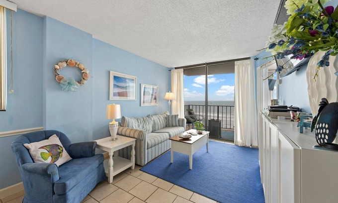 Crescent Beach Condo | Brightly colored oceanfront two-bedroom unit | Carolina Reef - 507