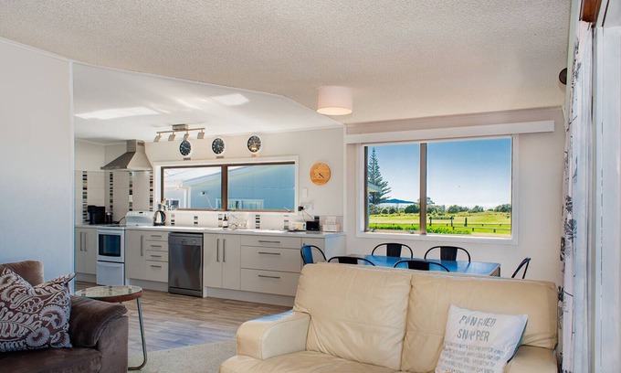Waihi Beach House | Brighton family bach - sea views, close to beach, park & shops, pet friendly!