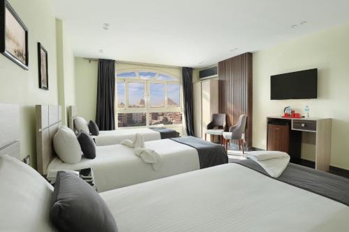 Kafrat al Jabal Hotel | Brothers Pyramids View