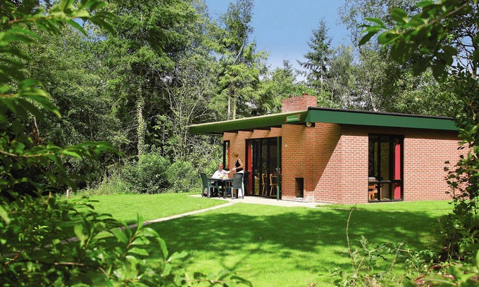 Municipality of Rijssen-Holten House | Bungalow with gas fireplace in a holiday park with a green location
