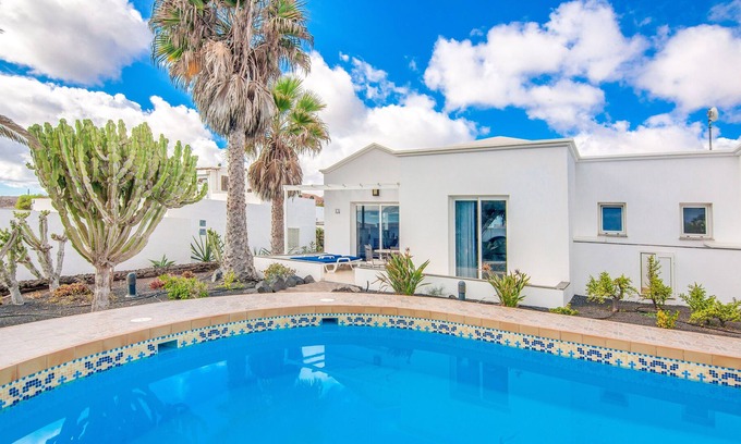 Charco del Palo House | C3, in a small complex with communal heated pool 100m from the sea
