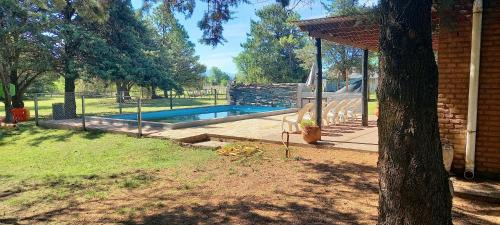 Los Reartes House | Cabañas UN LUGAR