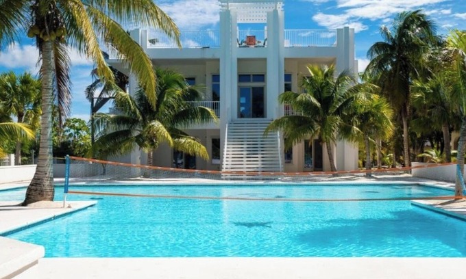 Sandy Point House | Calm Waters - Private Beachfront Villa. No Crowds. Just Ocean.