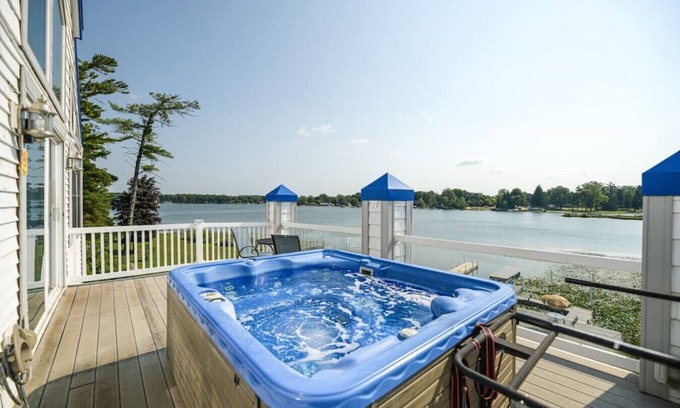 Spring Lake Apartment | Campau upper 3 leve · Lakefront 2 Kings 2 Hot tub(s) spa, fireplace-pit