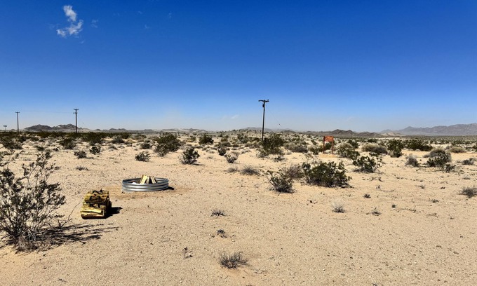 Wonder Valley RV Rental | Campground with fire pit under the stars
