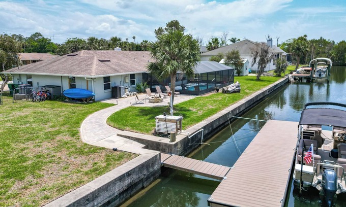 Indian Waters House | Canal-front 4BR/2BA home with pool and brand-new dock—room for 2 boats! Recently remodeled, 2-car garage, and minutes to the Gulf. Perfect Crystal River getaway! Boat and trailer parking on property; ramp nearby.