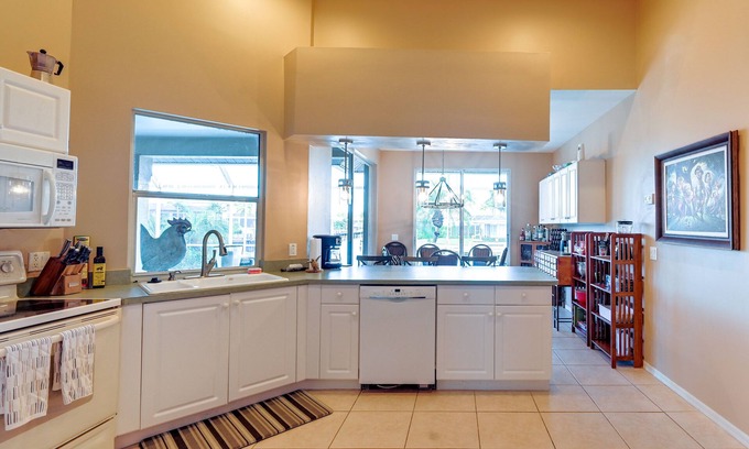 Marco Island Cottage | Canal-front Marco Island Home w/ Boat Dock + Pool!