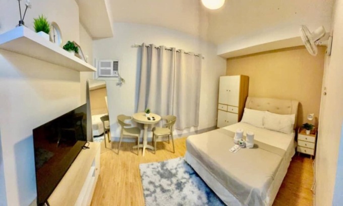 Cagayan de Oro Condo | Canary Yellowish Studio Condo Unit in Tranquil Cagayan De Oro City with WiFi, AC
