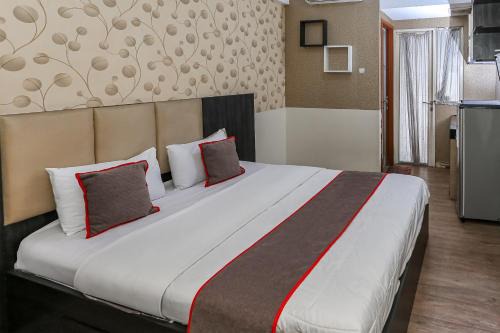 South Tangerang Hotel | Capital O 93372 Aurora Residence