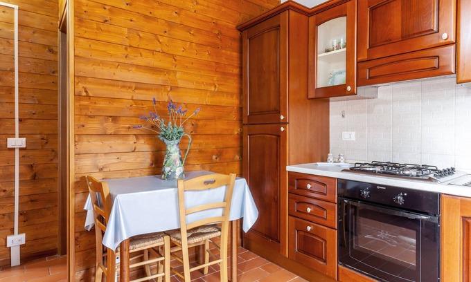 Marina di Massa RV Rental | Caravan "Bungalow Adamo" with Private Terrace & Wi-Fi