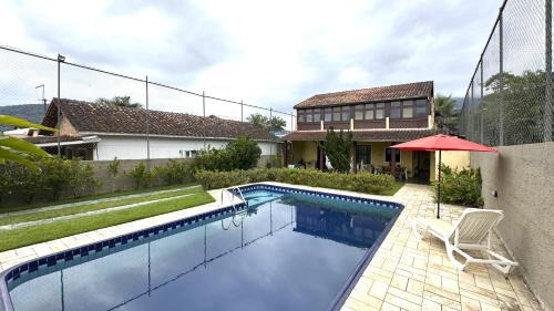 Jardim Capricornio House | Casa c piscina a 700m da Praia de Caraguatatuba SP