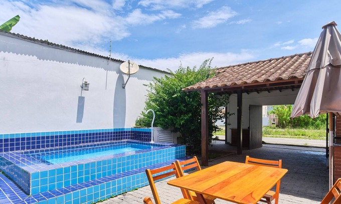 Jabaquara House | Casa Cravo e Canela com 3 Quartos, ar e Piscina