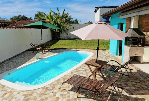 Balneario Mogiano House | Casa de Praia em Bertioga, São Paulocom Piscina Ar Condicionado Wifi a 500m do Mar