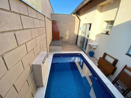 Tupy House | Casa em condomínio piscina privativa churrasqueira
