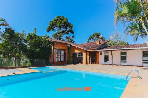 Cotia House | Casa em Cotia com piscina e área de lazer infantil