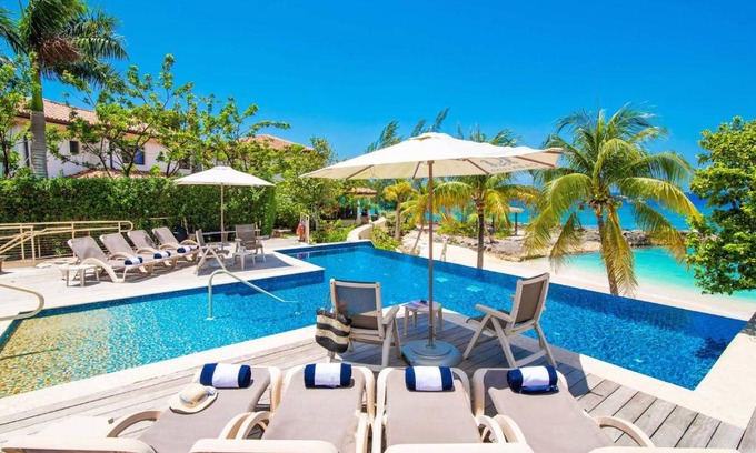 George Town Villa | Casa Luna 4 - Gated Seaside Village with Shared Pool, Jacquzi, & Beach Cove