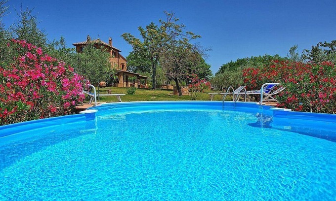 Montepulciano Villa | Casa Moscatella: A characteristic three-story age-old farm house surrounded by vineyards and olive groves, with Free WI-FI.
