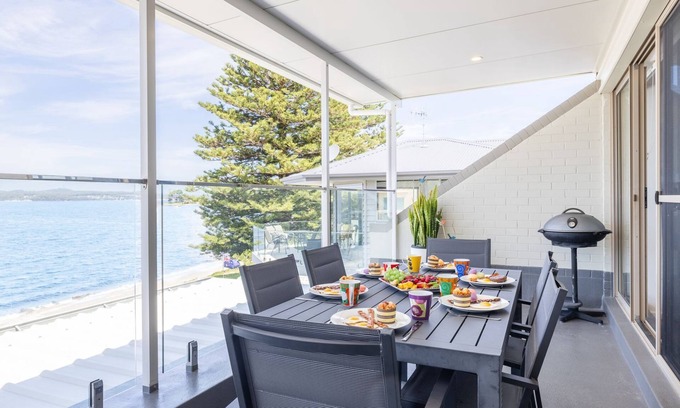 Soldiers Point Apartment | Casuarina's 6, 33 Soldiers Point Rd - stunning waterfront unit
