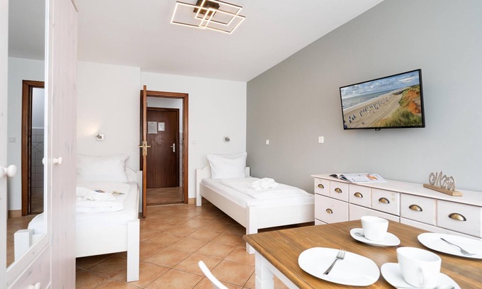 Westerland Apartment | Central app. for 2 persons, WLAN and TV, pets allowed.