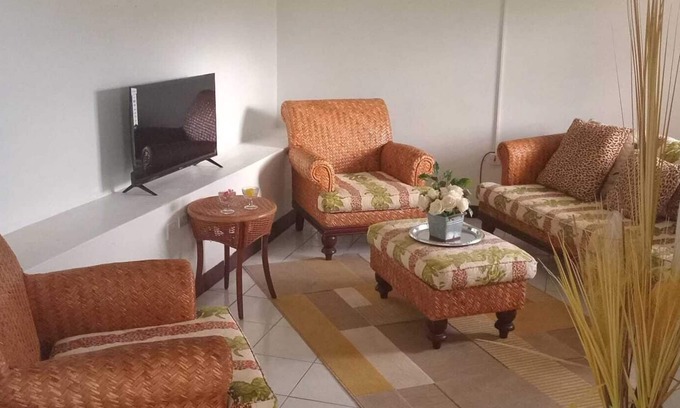 Ogees Apartment | "Central Gem: 5 Min to Airport, Frigate Bay & Downtown Port"