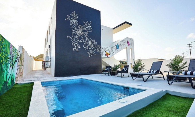 Marie Pampoen Apartment | Central Located 2 BR Near Mambo Bch - 10 min Walk2
