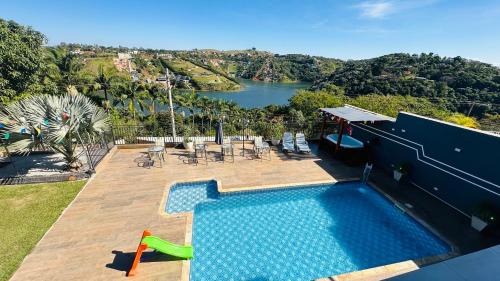 Igarata House | Chácara Gama em condomínio Igarata-SP - Jacuzzi com hidromassagem, piscina e sauna