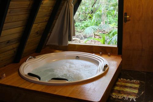 Praia Grande House | Chalé Suiço com Hidromassagem e café da Manhã