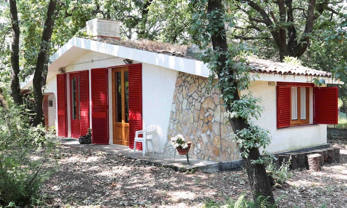 Lavinaio-Monterosso Ski Chalet | Chalet Villa Fini immersed in the oak forest.