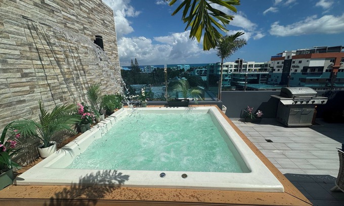 Tropical del Este Apartment | Charming 1-bedroom apartment with WiFi, Big private Jacuzzy Santo Domingo