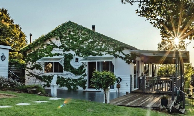 Dorrigo Cottage | Charming 1940's two bedroom cottage, established gardens, large verandah and BBQ