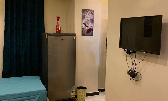 Sheikh Zayed City Apartment | Charming 2-bedroom studio in delightful 6th of October City with WiFi, AC
