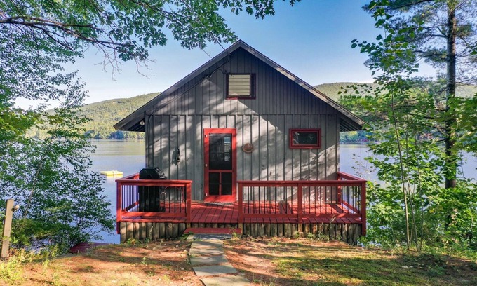 Moultonborough Cabin | Charming boathouse for two with deck overlooking Lake Kanasatka