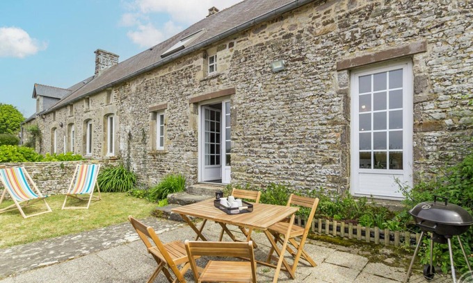 Canville-la-Rocque Cottage | Charming Cottage with Private Garden, Near Beaches, and Wood Stove