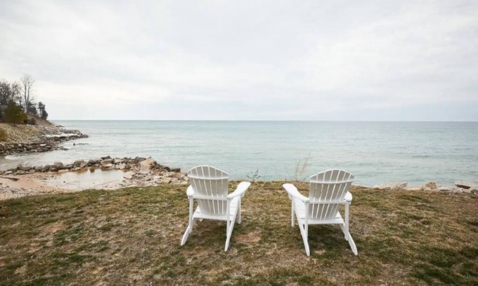 Mears Cottage | Charming Cottage with 180 degree views of Lk Michigan- short walk to sand dunes