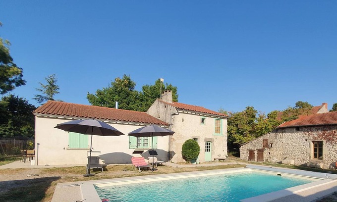 Charroux Cottage | Charming Renovated Cottage with Private Pool, Terrace, and Modern Amenities in Medieval Village