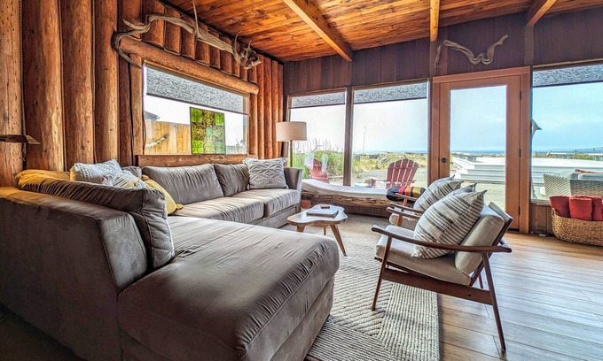 Oak Harbor House | Charming water view retreat with a wood-burning fireplace, deck, grill, and W/D