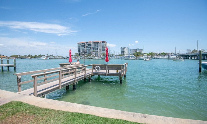 Treasure Island Condo | Charming Waterfront Retreat—Dock & Courtyard